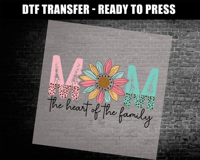 Black shirt featuring colorful “MOM” with sunflower design and the phrase “the heart of the family” – ready to press DTF transfer for Mother’s Day.