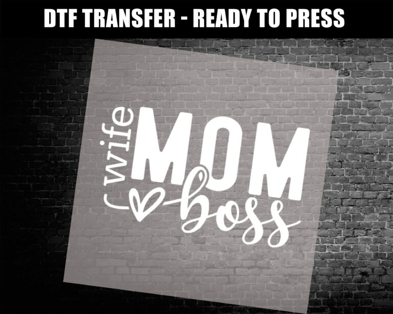 DTF transfer design featuring bold text “Mom Wife Boss” with script lettering and a heart, in white on gray background – perfect for strong moms and DIY gifts.